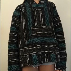 “Drug Rug” winter coat with hood.